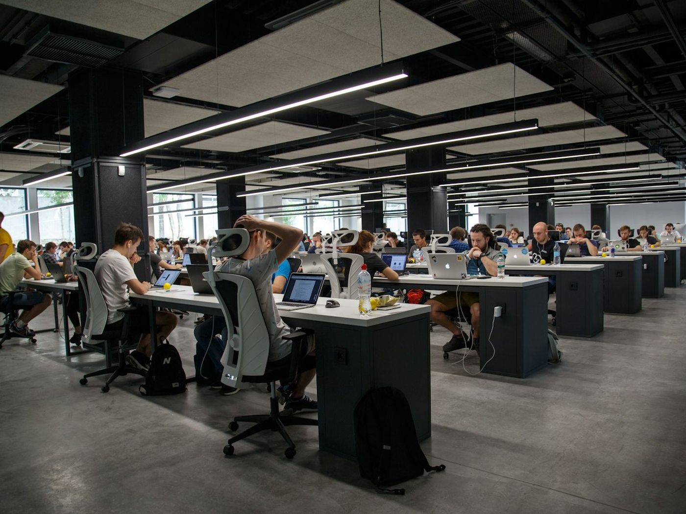 Engineering team working together in a modern workspace