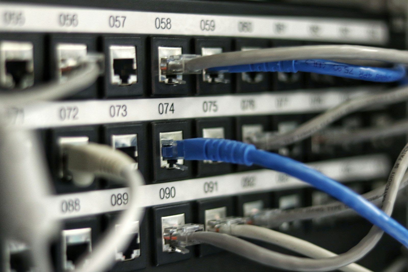 Network patch panel with colour-coded cabling